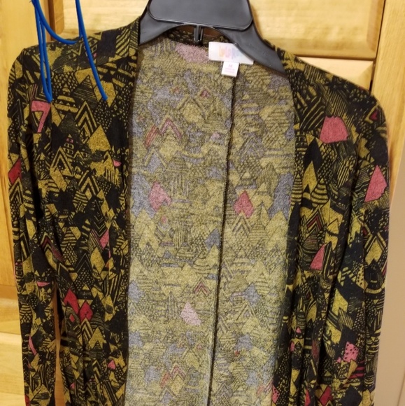 LuLaRoe Tops - Medium Sarah never worn LuLaRoe Tops - Medium Sarah never worn